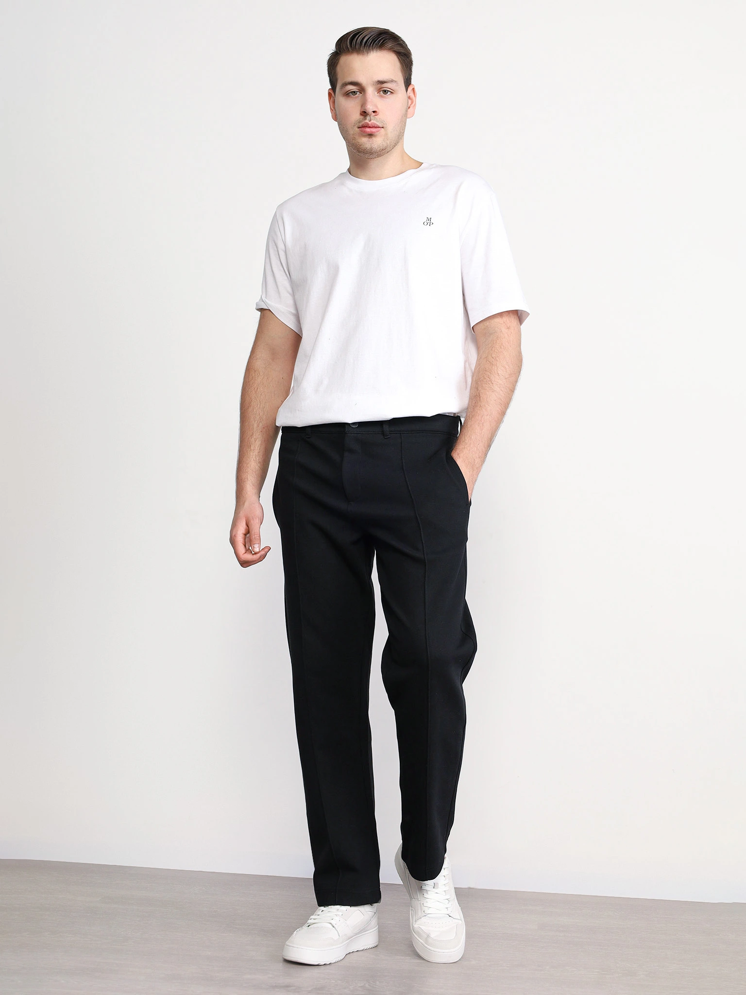 Брюки трикотажные черного цвета из смесового хлопка